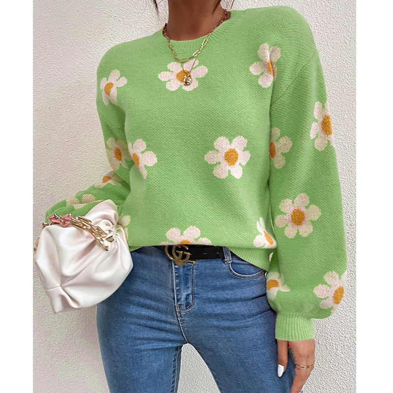 Pull femme avec motif floral et manches volumineuses Chic und Stil