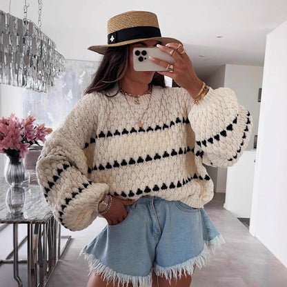 Pull en grosse maille pour femmes avec des manches volumineuses et un motif structuré Chic und Stil
