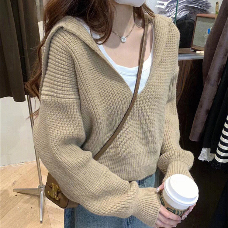 Dames pull-over V douillet avec capuche et coupe oversize Chic und Stil