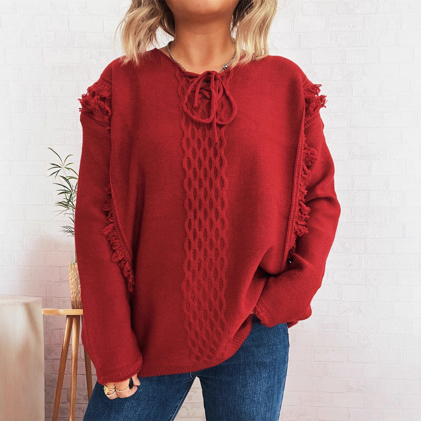 Pull en tricot oversize pour femmes avec un design de franges ludique et un motif en torsades Chic und Stil