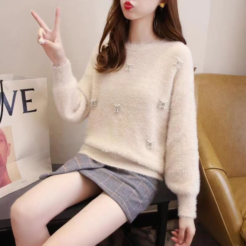 Femmes pull doux avec élégantes appliqués en perles Chic und Stil