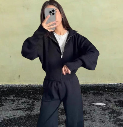 Pull en tricot sportif pour femmes avec col montant et fermeture éclair Chic und Stil