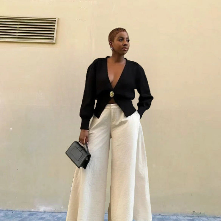 Dames Élégante Cardigan avec décolleté V plongeant et bouton décoratif Chic und Stil