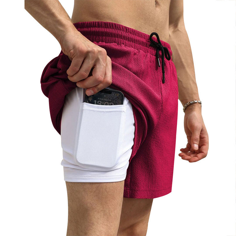 Shorts de sport pour hommes avec poche pratique pour smartphone Chic und Stil