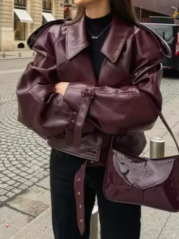 Ladies trendy oversized leather jacket with structured shoulders and waist belt Chic and Style