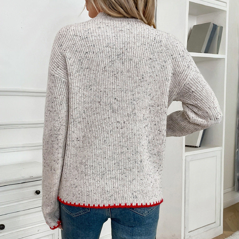 Pull-over en tricot pour femmes avec application en forme de cœur et ourlet décoratif Chic und Stil
