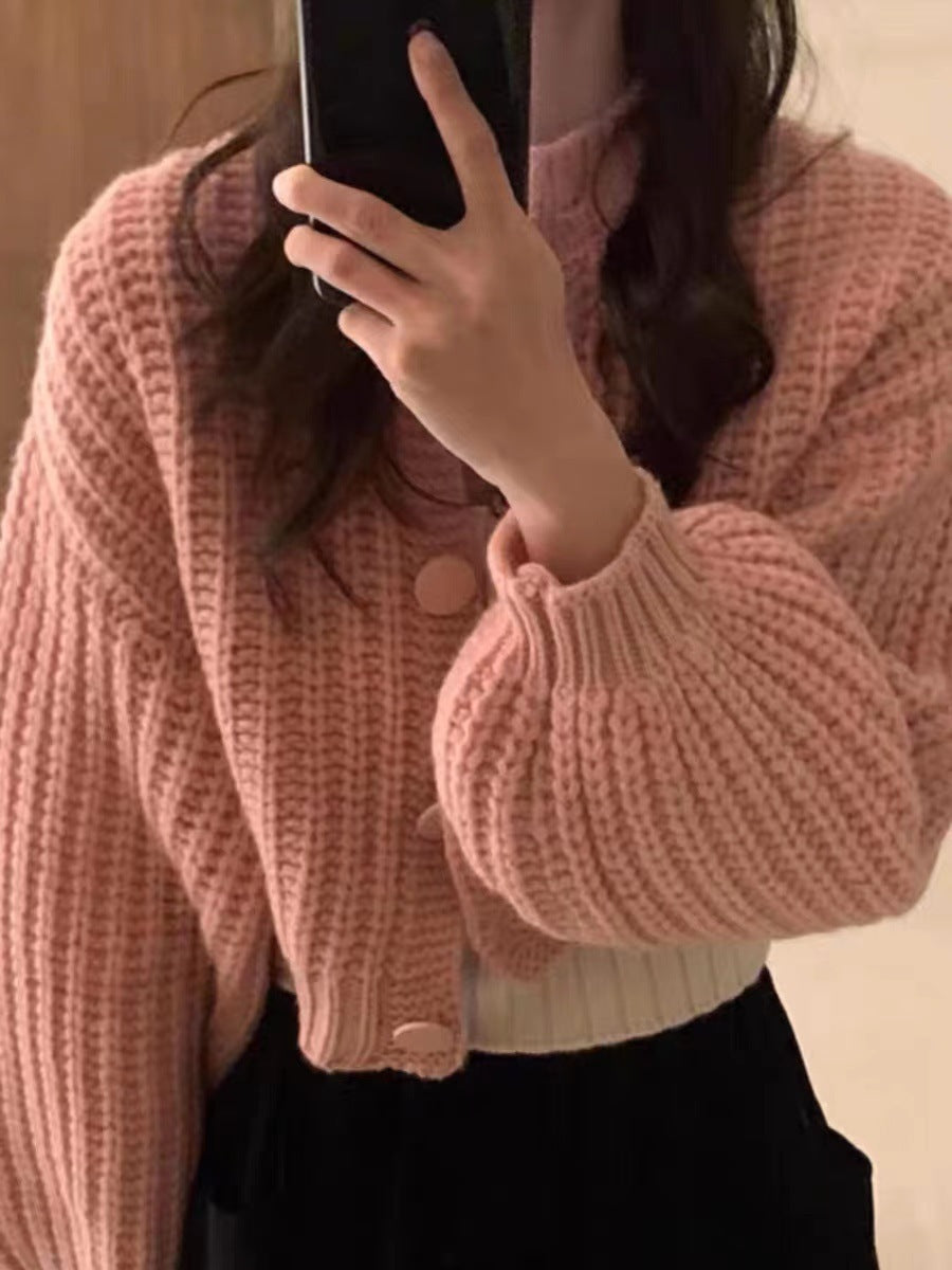 Cardigan en grosse maille pour femmes avec des manches volumineuses et de gros boutons Chic und Stil