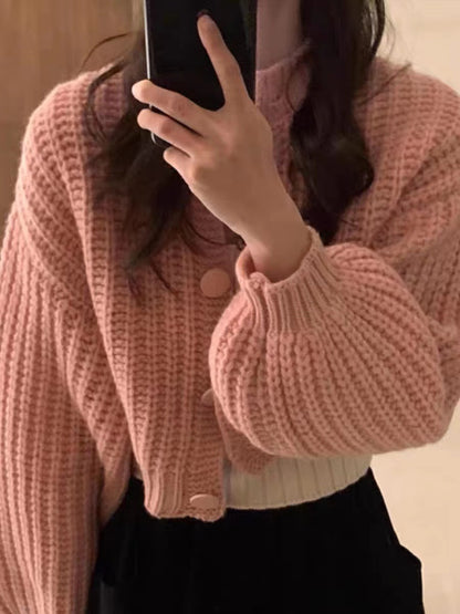 Cardigan en grosse maille pour femmes avec des manches volumineuses et de gros boutons Chic und Stil