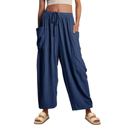 Casual harem pants for women with practical side pockets and loose fit Chic and Style