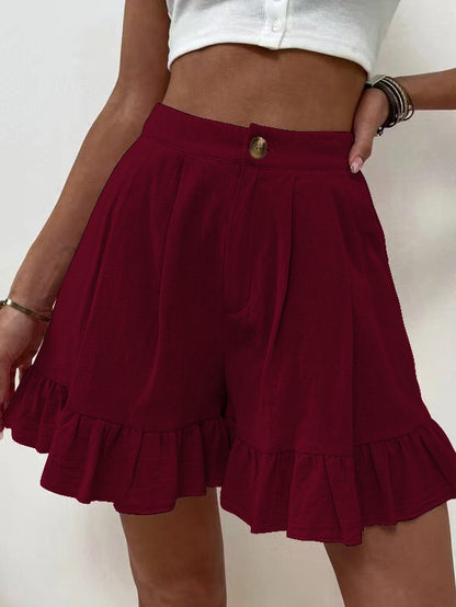 Shorts à volants pour femmes avec taille élastique et poches latérales Chic und Stil