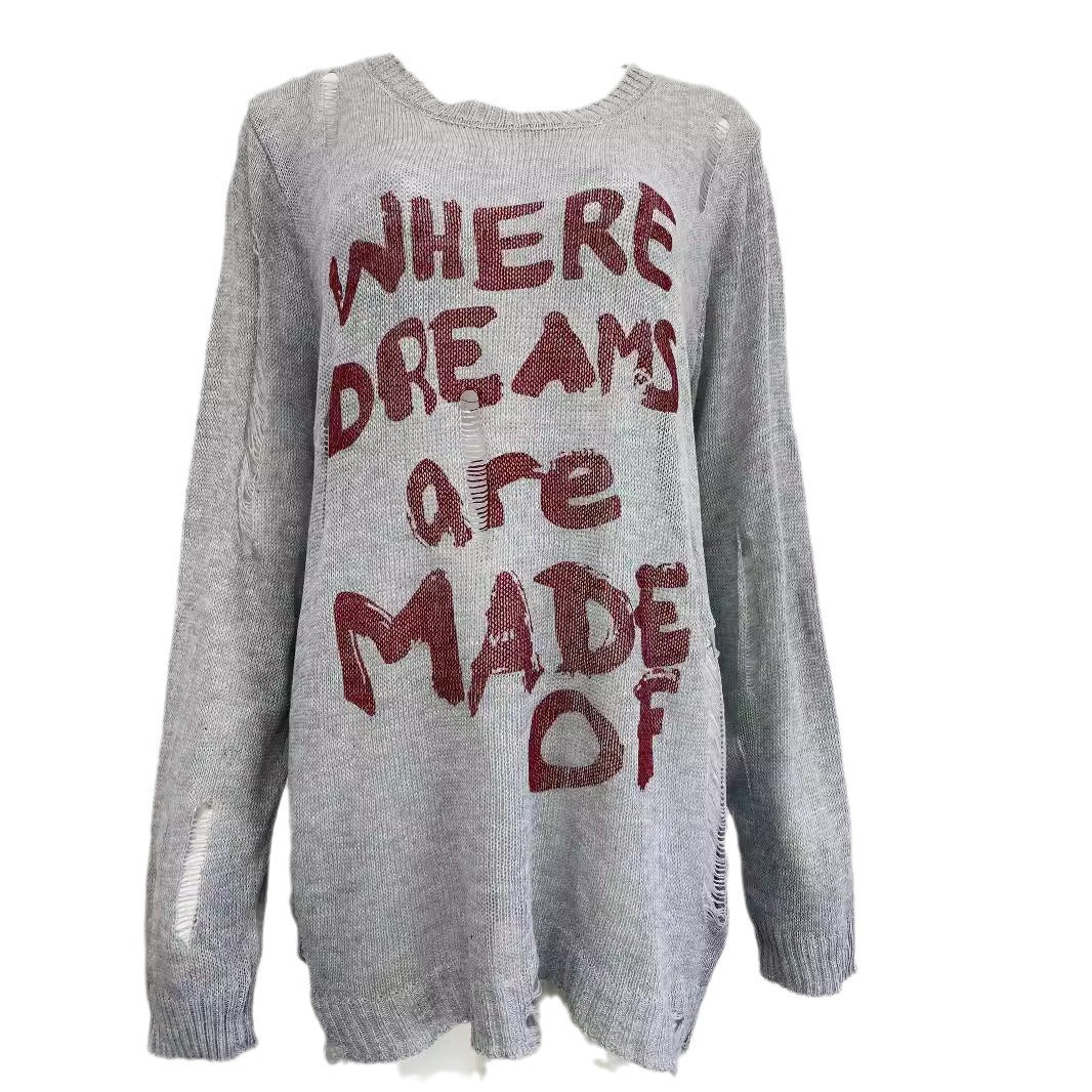 Dames pull oversize décontracté avec inscription accrocheuse et détails en tricot Chic und Stil