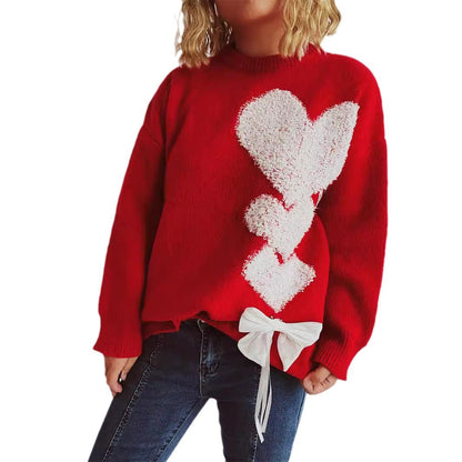 Pull femme avec design en forme de cœur et nœud décoratif Chic und Stil