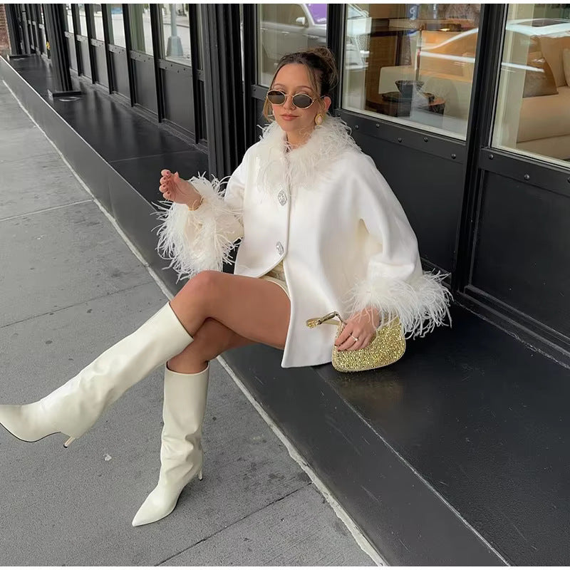 Manteau élégant féminin avec plumes Chic & Stil