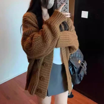 Dames gros tricot cardigan avec des manches surdimensionnées et de grands détails de bouton Chic und Stil