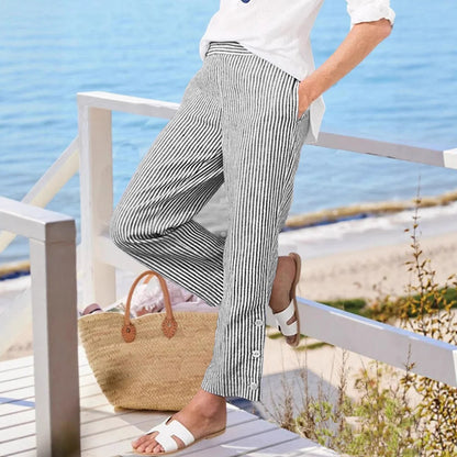 Long striped pants for women with button details and side pockets Chic und Stil