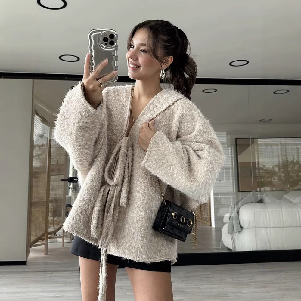 Ladies soft pullover with trendy knot belt Chic and Style