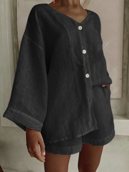 Casual women's outfit with a loose top and shorts Chic and Style