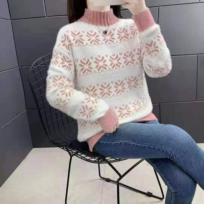Pull en tricot pour femmes avec un motif moderne de flocons de neige et col montant Chic und Stil