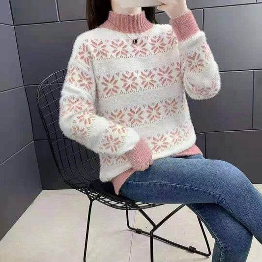 Pull en tricot pour femmes avec un motif moderne de flocons de neige et col montant Chic und Stil