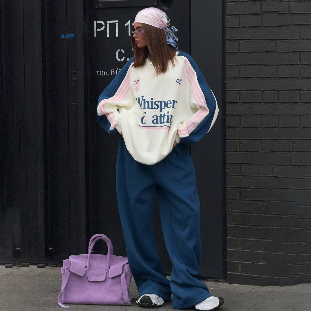 Ladies Casual Sports Outfit with a Relaxed Sweatshirt and Comfortable Jogging Pants Chic and Style