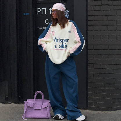 Ladies Casual Sports Outfit with a Relaxed Sweatshirt and Comfortable Jogging Pants Chic and Style