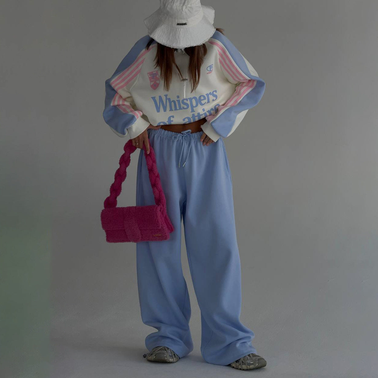 Ladies Casual Sports Outfit with a Relaxed Sweatshirt and Comfortable Jogging Pants Chic and Style