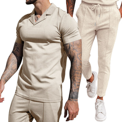 Elegant men's short sleeve polo with textured design and matching slim-fit trousers Chic and Style