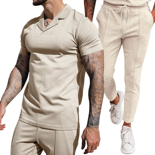 Elegant men's short sleeve polo with textured design and matching slim-fit trousers Chic and Style