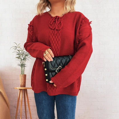 Pull en tricot oversize pour femmes avec un design de franges ludique et un motif en torsades Chic und Stil