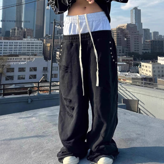 Pantalon cargo décontracté à coupe relax pour femmes avec taille élastique et ornement en rivets Chic und Stil