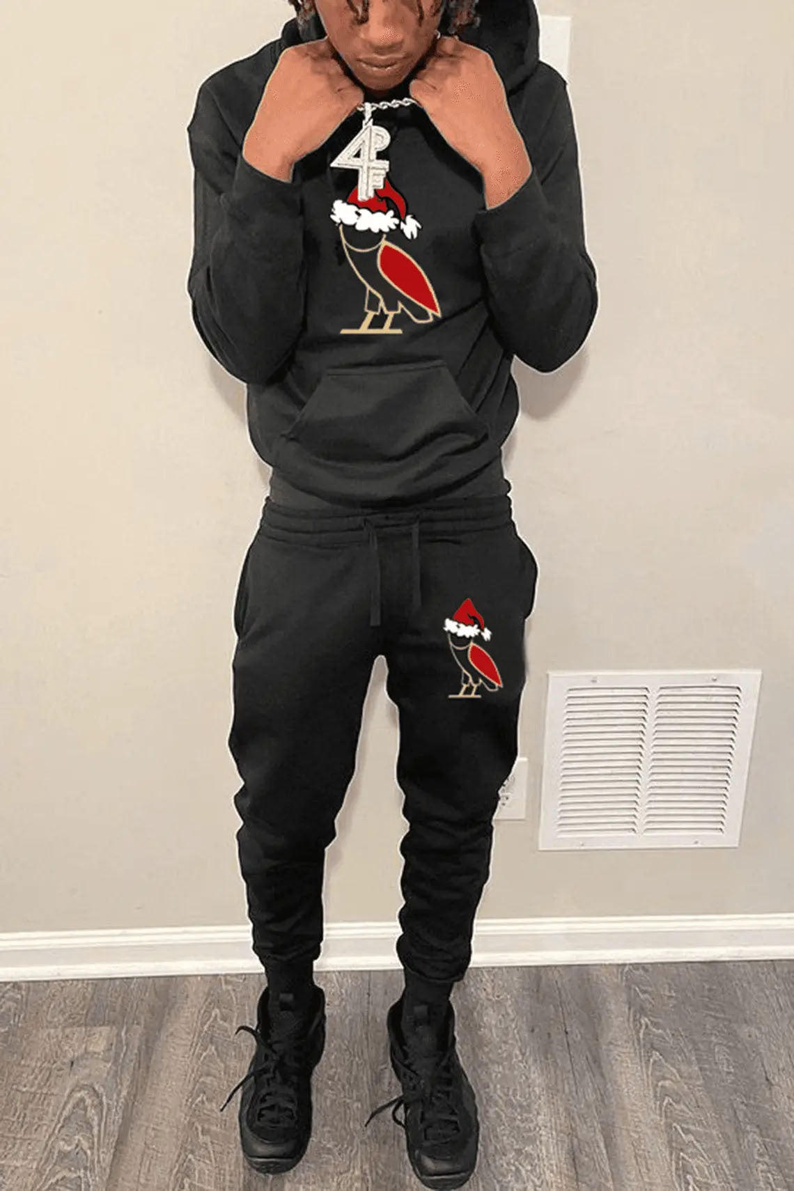 Women's hoodie and jogger pants set with festive design Chic and Style