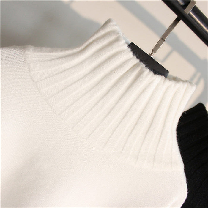 Pull-over oversized à col roulé pour femmes avec des manches fendues et une texture côtelée Chic und Stil