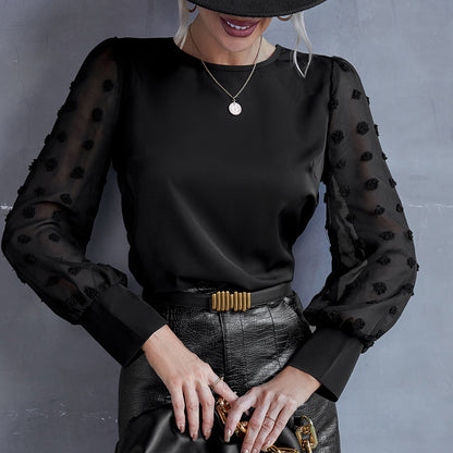 Chemisier femme avec des manches transparentes bouffantes et un détail décoratif Chic und Stil