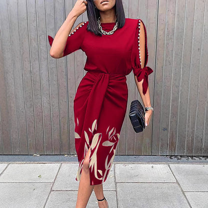 Robe portefeuille pour dames avec des manches décoratives et un ourlet floral Chic und Stil