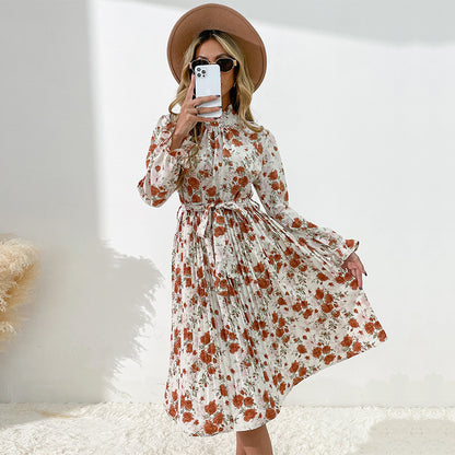 Robe midi pour dames avec motifs floraux et ceinture ajustable Chic und Stil