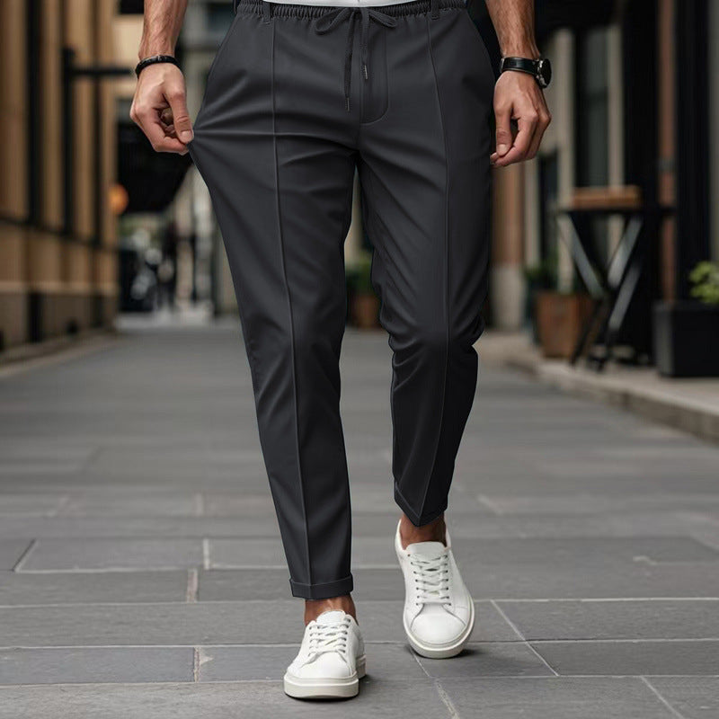 Men's fashionable sports pants with elastic waistband and practical welt pockets Chic and Style