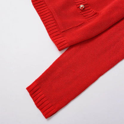 Women's knitted jacket with elegant button details and practical pockets Chic and Style