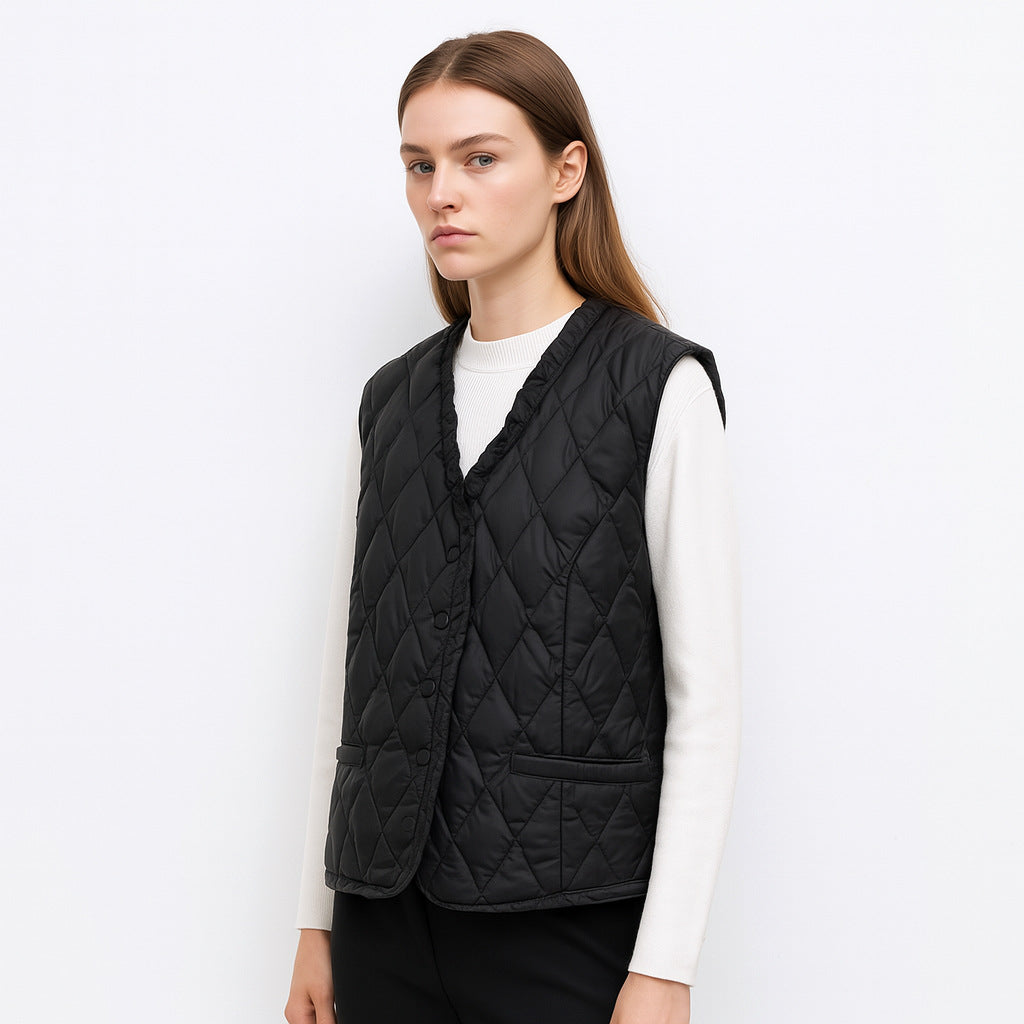 Dames gilet matelassé avec coupe asymétrique Chic und Stil