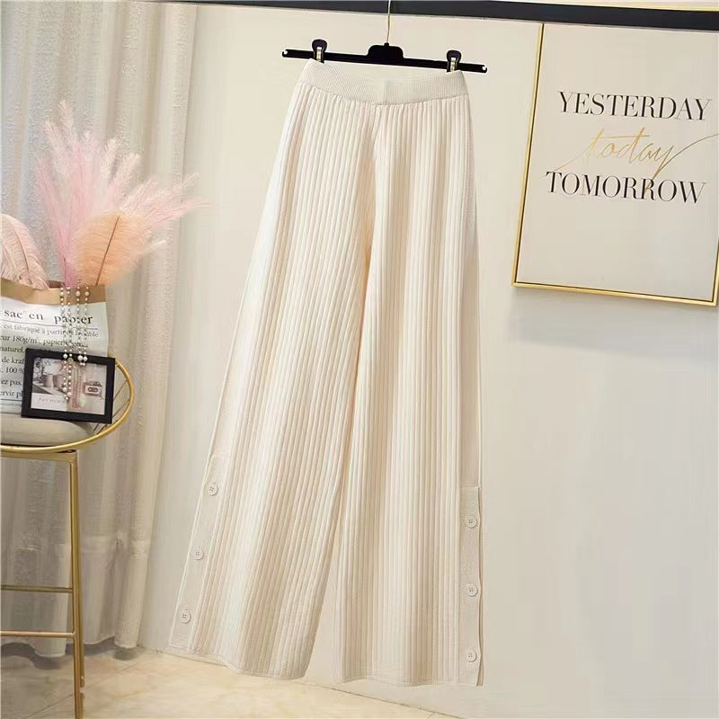 Pleated palazzo pants for women with button details Chic and Style