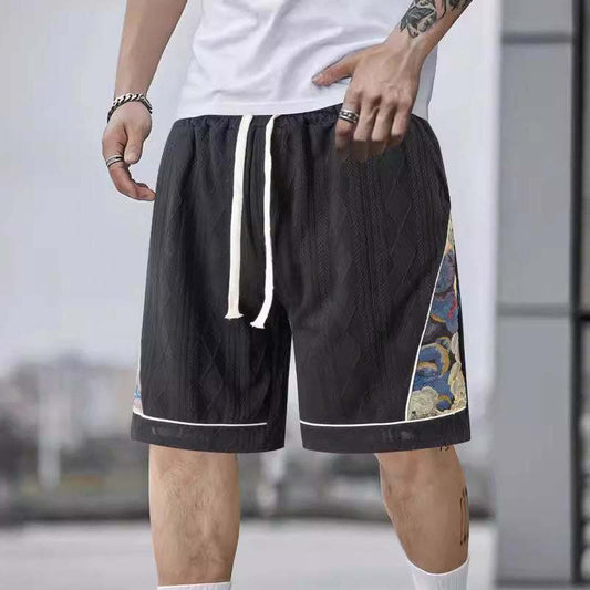 Men's athletic leisure pants with a creative floral design Chic and Style