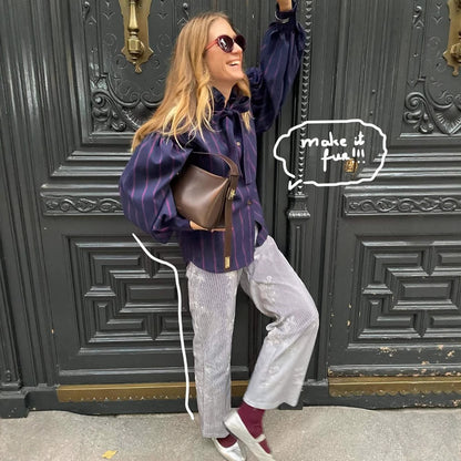 Chemisier à manches longues pour femmes avec un design rayé et un col à volants Chic und Stil