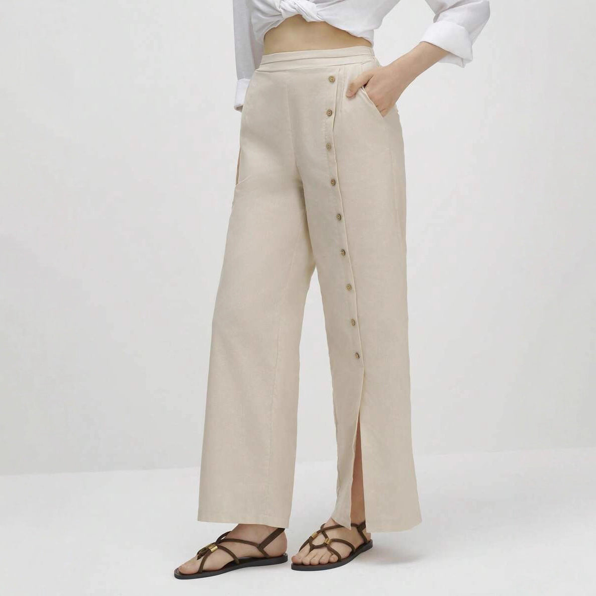 Linen wide-leg pants for women with button details and elegant slit Chic and Style