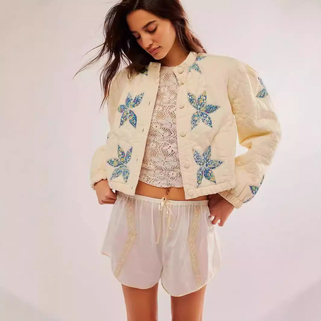 Dames bomber jacket matelassé avec design floral Chic und Stil