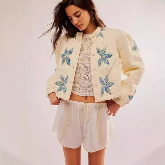 Dames bomber jacket matelassé avec design floral Chic und Stil