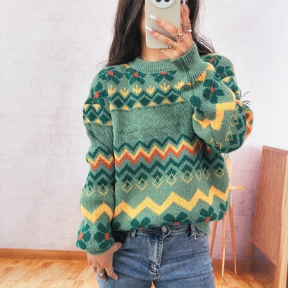 Dames gros tricot pull avec motif zigzag coloré et accents floraux Chic und Stil