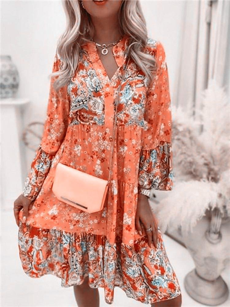 Robe blouson élégante pour dames avec design floral et volants Chic und Stil