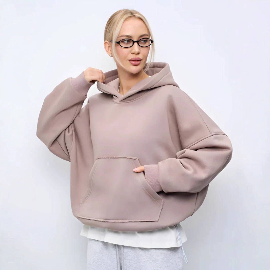 Pull à capuche oversized pour femmes avec une coupe décontractée et une poche kangourou pratique Chic und Stil