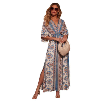 Robe maxi femme avec un élégant décolleté en V, fente sur le côté et motif floral Chic & Stil