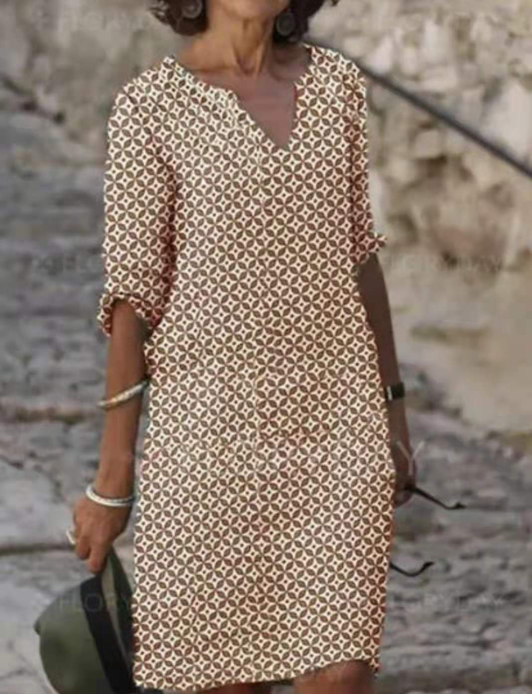 Robe midi décontractée pour femmes avec décolleté en V et boutons pratiques Chic und Stil