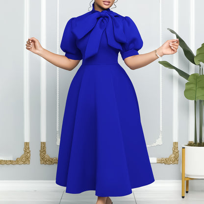 Robe midi femme avec un élégant noeud et des manches bouffantes Chic und Stil